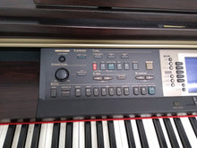 Load image into Gallery viewer, Yamaha Clavinova CVP-205 in rosewood with big speakers in base stock nr 22176