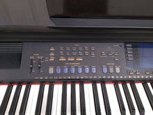 Load image into Gallery viewer, Yamaha Clavinova CVP-107 digital piano / arranger glossy black / dark rosewood. stock nr 22173