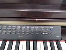 Load image into Gallery viewer, Yamaha Clavinova CLP-270 in dark rosewood with piano stool. stock n. 22193