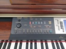 Load image into Gallery viewer, Yamaha Clavinova CVP-205 in mahogany with big speakers in base stock nr 22194