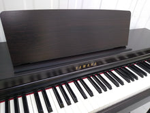 Load image into Gallery viewer, Yamaha clavinova CLP-525 digital piano in rosewood colour stock # 22210