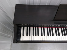 Load image into Gallery viewer, Yamaha clavinova CLP-525 digital piano in rosewood colour stock # 22210