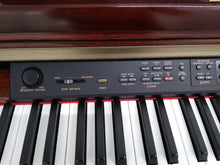 Load image into Gallery viewer, Yamaha Clavinova CLP-150 Digital Piano with stool in mahogany stock nr 22241