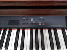 Load image into Gallery viewer, Yamaha Clavinova CLP-860 Digital Piano and stool in mahogany stock # 22250