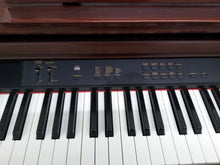 Load image into Gallery viewer, Yamaha Clavinova CLP-860 Digital Piano and stool in mahogany stock # 22250