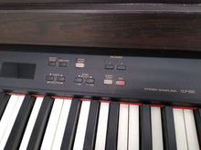 Load image into Gallery viewer, Yamaha Clavinova CLP-820 Digital Piano in rosewood weighted keys stock nr 22256