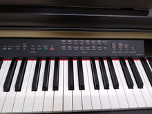 Load image into Gallery viewer, Yamaha Clavinova CLP-130 Digital Piano and stool in rosewood stock number 22268