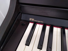 Load image into Gallery viewer, Roland RP301 Digital Piano in rosewood Full Size 88 weighted keys, 3 pedals stock # 22247