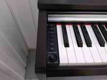 Load image into Gallery viewer, Yamaha Arius YDP-135 digital piano in rosewood stock # 22258