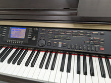 Load image into Gallery viewer, Yamaha Clavinova CVP-301 Digital Piano / arranger in rosewood. stock # 22296