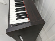 Load image into Gallery viewer, Kawai CL30 Digital Piano in rosewood super slim space saving stock number 22290