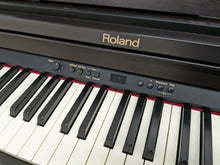 Load image into Gallery viewer, Roland RP301 Digital Piano and stool in rosewood stock # 22300