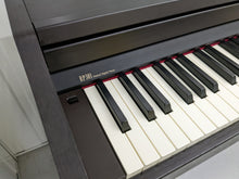 Load image into Gallery viewer, Roland RP301 Digital Piano and stool in rosewood stock # 22300
