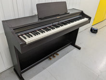 Load image into Gallery viewer, Roland RP301 Digital Piano and stool in rosewood stock # 22300