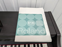 Load image into Gallery viewer, Roland RP301 Digital Piano and stool in rosewood stock # 22300