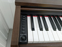 Load image into Gallery viewer, Yamaha Arius YDP-140 Digital Piano in rosewood stock number 22304