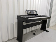 Load image into Gallery viewer, Yamaha DGX-660 black portable grand piano keyboard and stand stock #22323