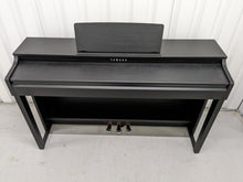 Load image into Gallery viewer, Yamaha clavinova CLP-525 digital piano in satin black colour stock # 22314