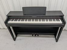 Load image into Gallery viewer, Yamaha clavinova CLP-525 digital piano in satin black colour stock # 22314