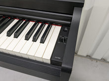 Load image into Gallery viewer, Yamaha clavinova CLP-525 digital piano in satin black colour stock # 22314