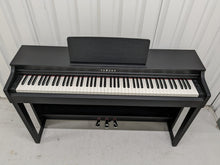 Load image into Gallery viewer, Yamaha clavinova CLP-525 digital piano in satin black colour stock # 22314