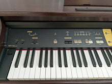 Load image into Gallery viewer, Roland KR-5 Intelligent Digital Piano and stool, 88 weighted keys stock # 22339