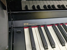 Load image into Gallery viewer, Roland HP-505 Digital Piano in glossy black wooden action keys  Stock  nr 22343