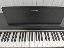 Load image into Gallery viewer, Yamaha Arius YDP-142 Digital Piano in satin black. Stock number 22347