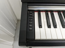 Load image into Gallery viewer, Yamaha Arius YDP-142 Digital Piano in satin black. Stock number 22347