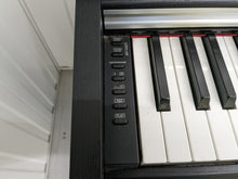 Load image into Gallery viewer, Yamaha Arius YDP-142 Digital Piano in satin black. Stock number 22347