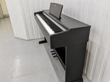 Load image into Gallery viewer, Yamaha Arius YDP-142 Digital Piano in satin black. Stock number 22347
