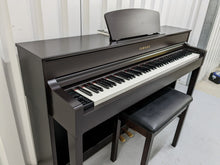 Load image into Gallery viewer, Yamaha Clavinova CLP-535 and matching stool in dark rosewood stock # 22354