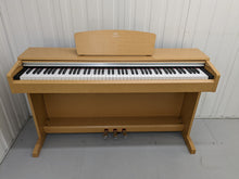 Load image into Gallery viewer, Yamaha Arius YDP-141 digital piano in light oak stock # 22365
