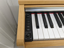 Load image into Gallery viewer, Yamaha Arius YDP-141 digital piano in light oak stock # 22365