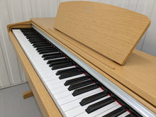 Load image into Gallery viewer, Yamaha Arius YDP-141 digital piano in light oak stock # 22365