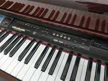 Load image into Gallery viewer, Roland KR-575 Intelligent Digital Piano / arranger glossy mahogany stock # 22381