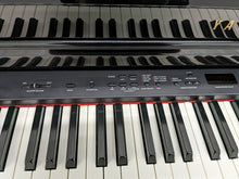 Load image into Gallery viewer, Yamaha Clavinova CLP-440 Digital Piano and stool in glossy black stock no. 22385