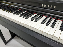 Load image into Gallery viewer, Yamaha clavinova CLP-525 digital piano and stool in satin black stock # 22378