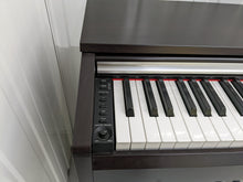 Load image into Gallery viewer, Yamaha Arius YDP-135 digital piano and stool in rosewood stock # 22392