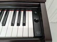 Load image into Gallery viewer, Yamaha Arius YDP-144 digital piano in rosewood, weighted keys, stock nr 22398