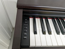 Load image into Gallery viewer, Yamaha Arius YDP-144 digital piano in rosewood, weighted keys, stock nr 22398