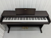 Load image into Gallery viewer, Yamaha Arius YDP-144 digital piano in rosewood, weighted keys, stock nr 22399