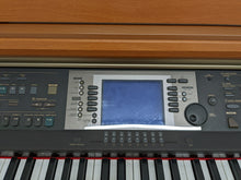 Load image into Gallery viewer, Yamaha Clavinova CVP-204 in cherry wood with matching stool. stock nr 22395