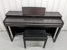 Load image into Gallery viewer, Yamaha clavinova CLP-525 digital piano and stool in dark rosewood stock # 22414