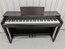 Load image into Gallery viewer, Yamaha clavinova CLP-525 digital piano and stool in dark rosewood stock # 22414