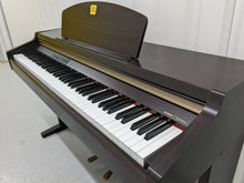 Load image into Gallery viewer, Yamaha Clavinova CLP-920 Digital Piano in rosewood, weighted keys stock nr 22433
