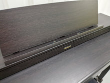Load image into Gallery viewer, Roland HP-505 Digital Piano and stool in dark rosewood wooden action keys  Stock  nr 22439