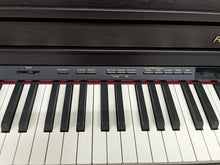 Load image into Gallery viewer, Roland HP-505 Digital Piano and stool in dark rosewood wooden action keys  Stock  nr 22439