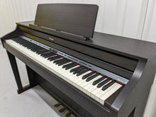Load image into Gallery viewer, Roland HP-505 Digital Piano and stool in dark rosewood wooden action keys  Stock  nr 22439