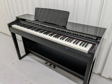 Load image into Gallery viewer, Yamaha Clavinova CLP-525PE digital piano in glossy black ebony stock # 22427